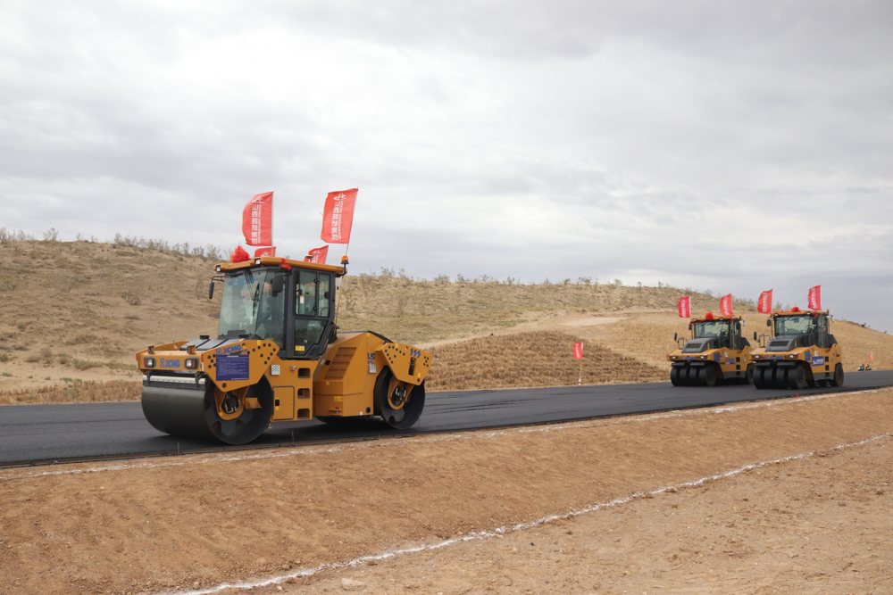 Unmanned road construction fleet (autonomous rollers and pavers)